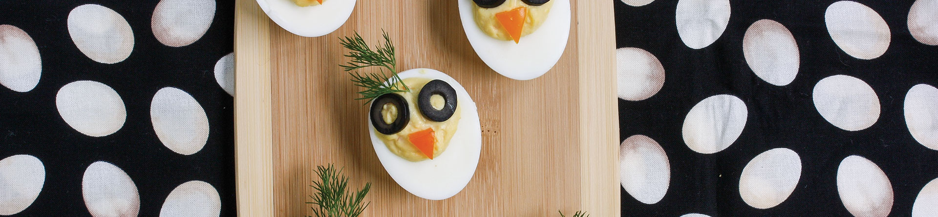 Deviled eggs decorated as chicks