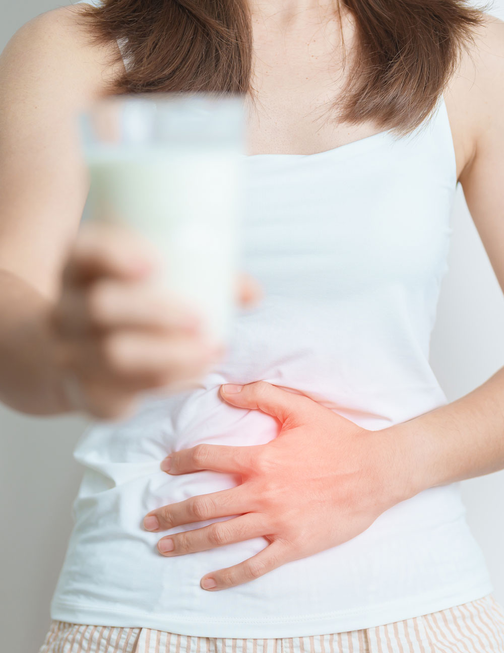 Person experiencing stomach discomfort
