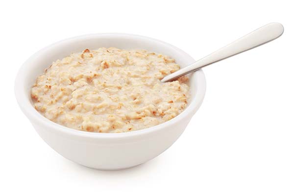 Bowl of oatmeal with a spoon