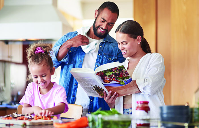 family fixing meal