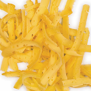 Shredded cheese scattered on white background