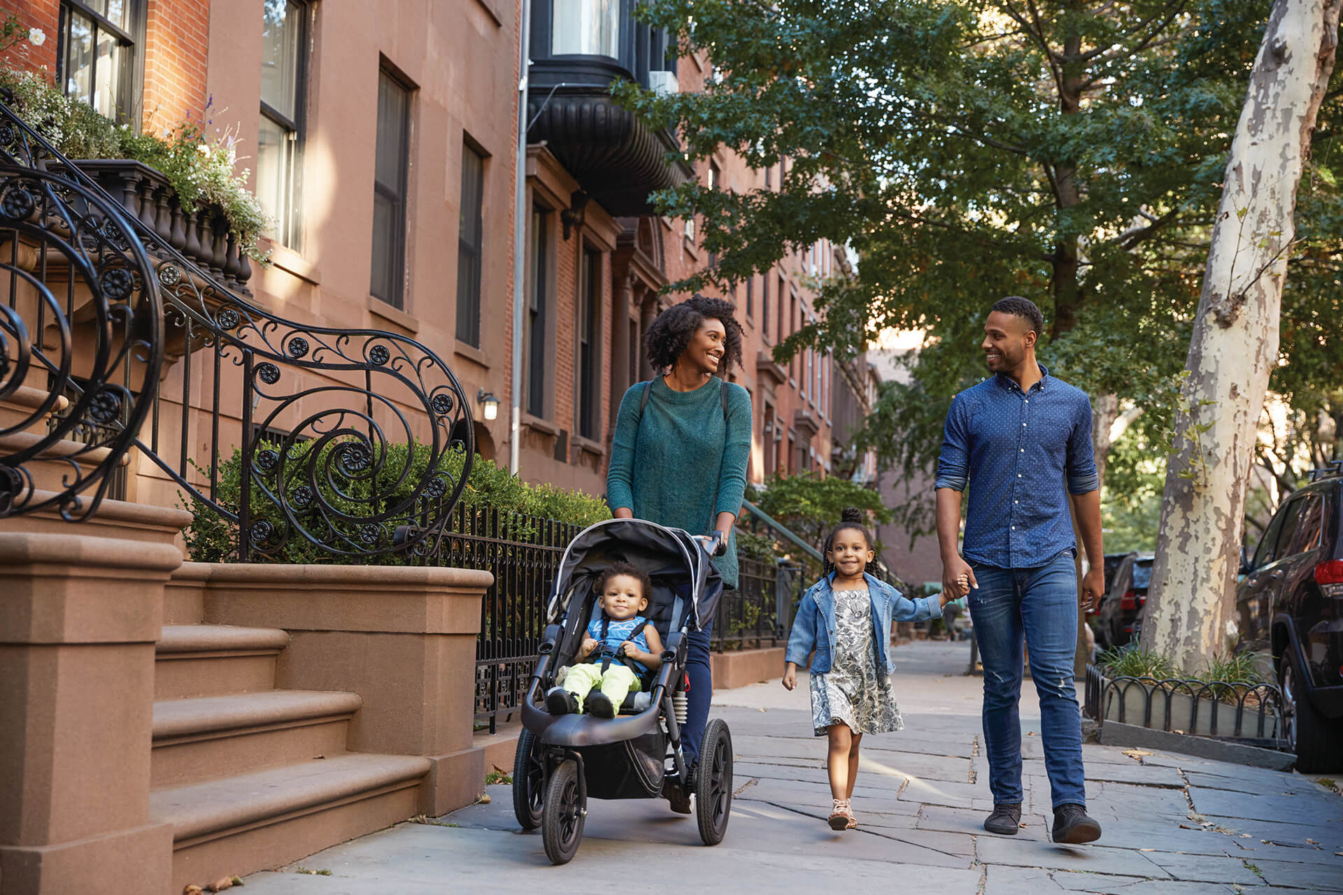 family walking street