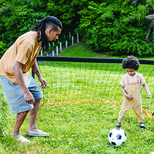 family playing football