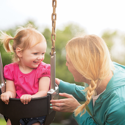 mom daughter swinging