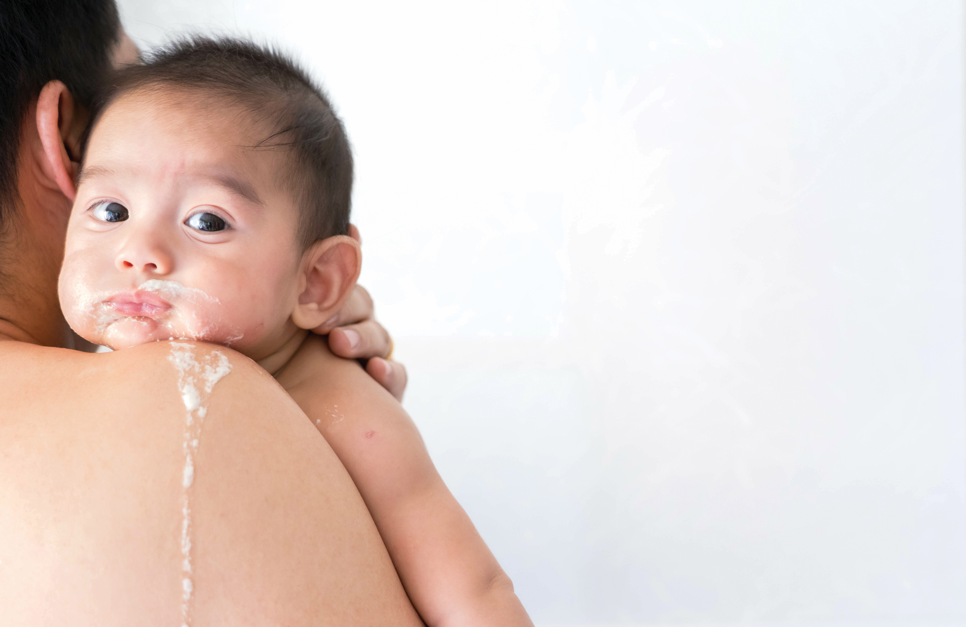 Baby drinking dad