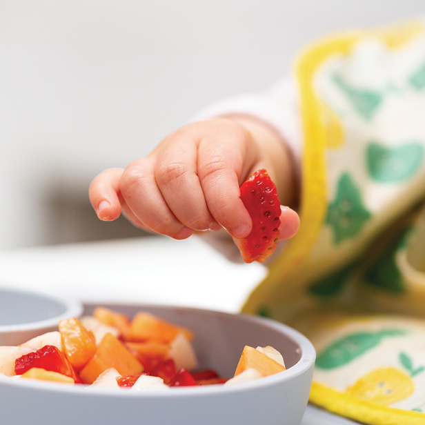 Baby Eating Fruit