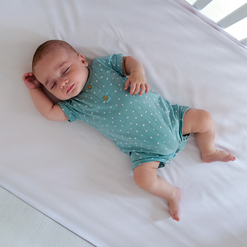 Baby lying on back