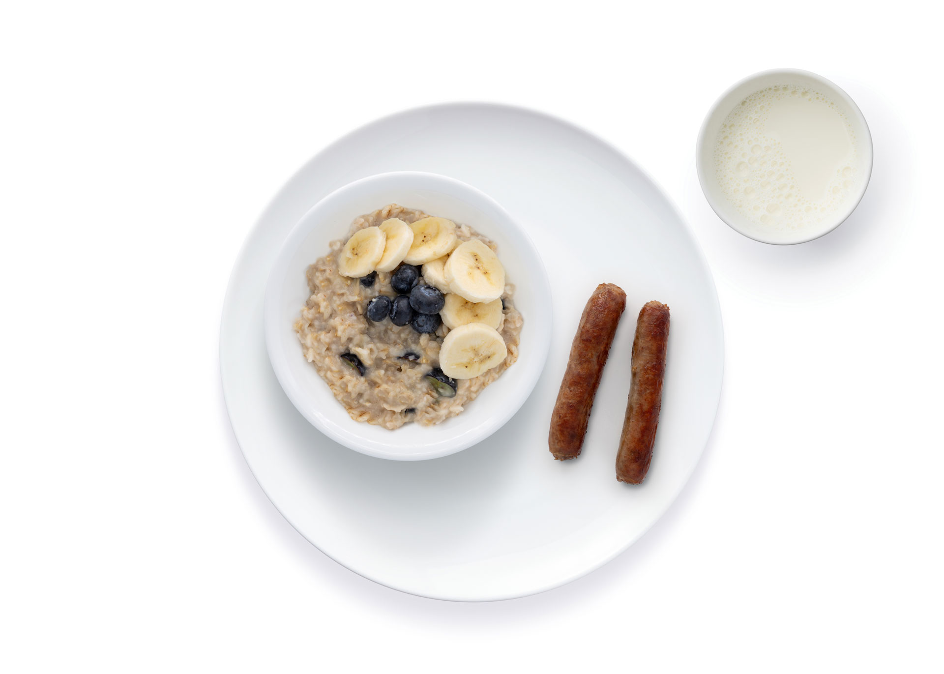 Oatmeal with banana blueberries sausage