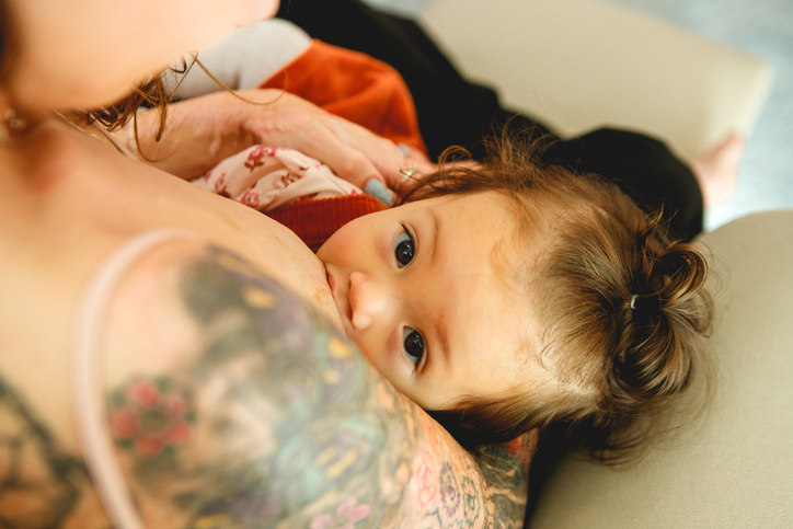 Brazilian woman breastfeeding her baby